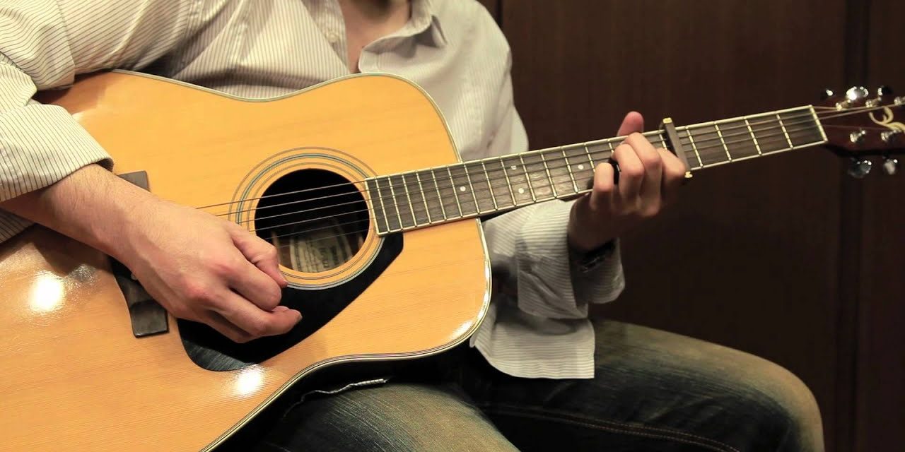 Pemakaian Gitar Sebuah Alat Musik Berdawai
